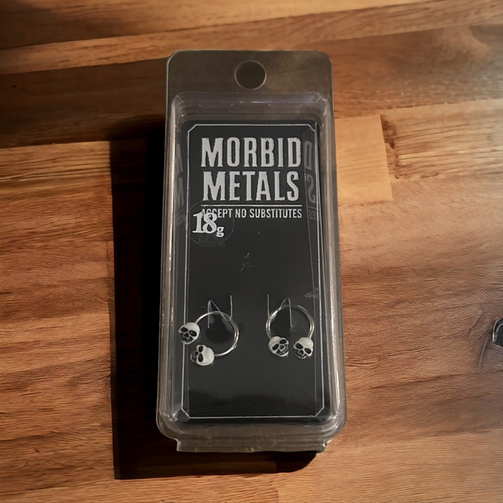 Morbid Metals 18g white skull body jewelry